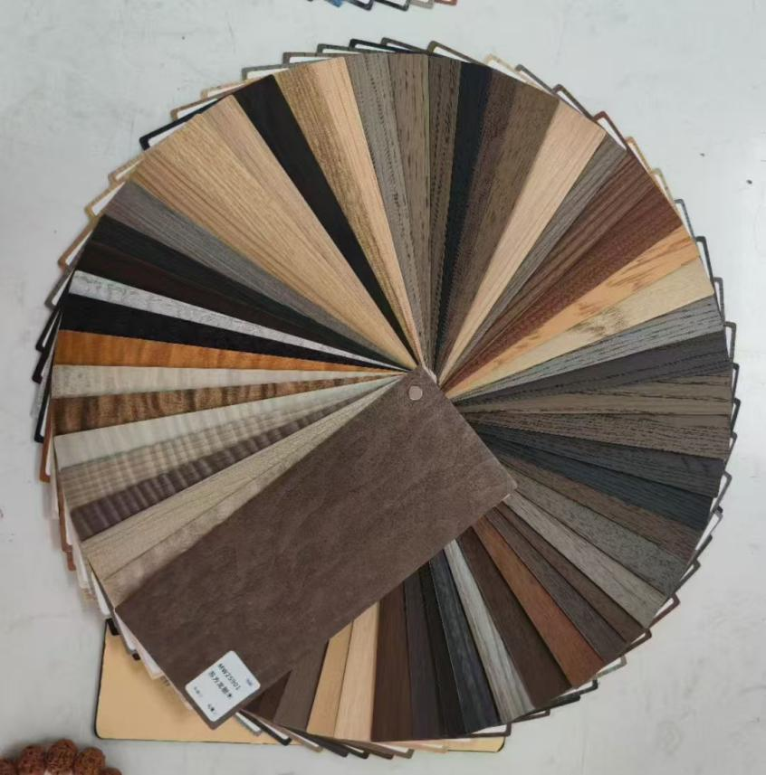 الديكور السطحي للأبواب المصنوعة من الفولاذ المقاوم للصدأ: تحليل جدوى تطبيق فيلم الحبوب الخشبية